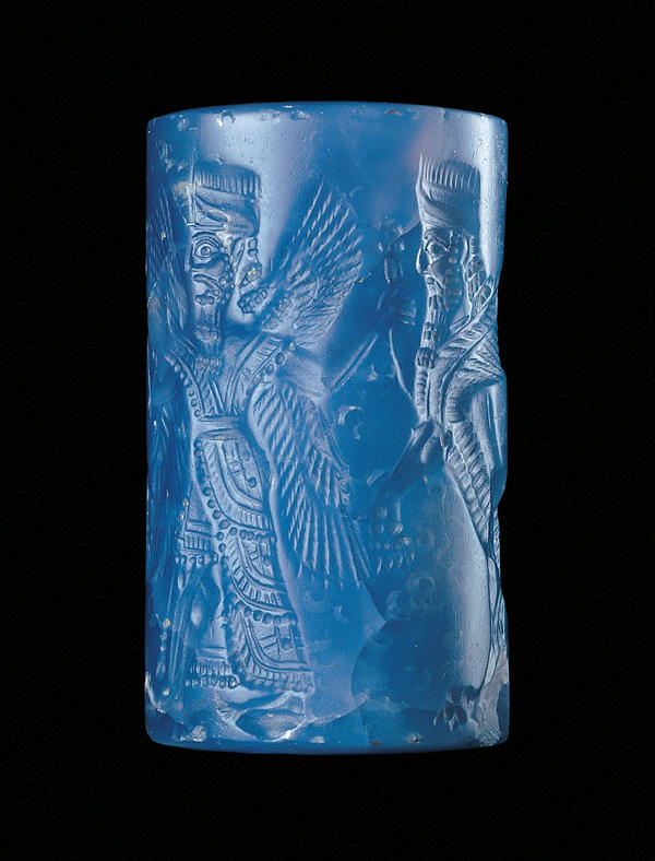 Winged god Ashur seal