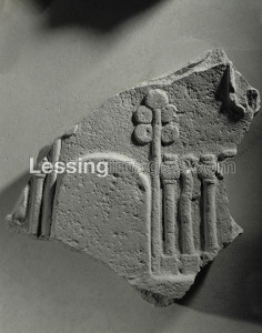Fragment of a stele, raised standards. From Tello. Period of king Gudea, around 2100 BCE. Limestone, H: 34,3 cm AO 4581