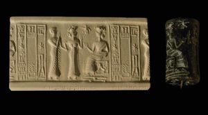 Cylinder seal: two orants before a goddess. Cuneiform inscription in the name of the scribe Ur-Nanshe. From Tello
