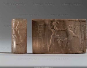 Cylinder seal and imprint, Neo-Babylonian, 612-539 BCE. A man or deity subduing a lion. Chalcedony, H: 3,6 cm AO 22353