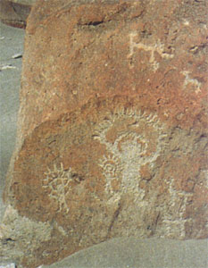 21 - Toro Muerto, Peru 12,000-10,000 B.C., star-people on ancient rock carvings, similar carvings are found all over the world
