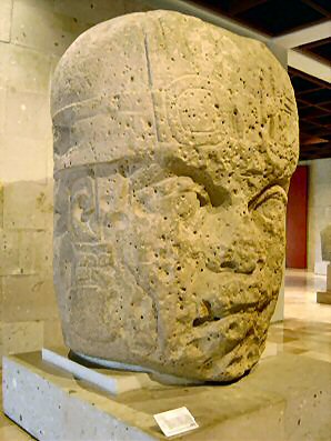 2i -Olmec head artefact, possibly a king's head, hundreds of Olmec heads have been discovered so far, kings carved in succession, Olmec's are black Africans shipped to the Yucatan by Ningishzidda due to his expulsion from Egypt by his brother Marduk, the 1st earthlings to inhabit So. America, as dislpayed by Sitchin in the Mexico City Museum