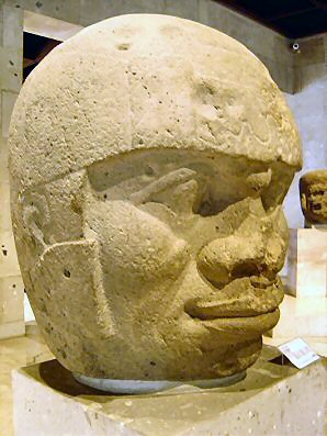 2j - Olmec head artefact, possibly a king's head, hundreds of Olmec heads have been discovered so far, kings carved in succession, Olmec's are black Africans shipped to the Yucatan by Ningishzidda due to his expulsion from Egypt by his brother Marduk, the 1st earthlings to inhabit So. America, as dislpayed by Sitchin in the Mexico City Museum