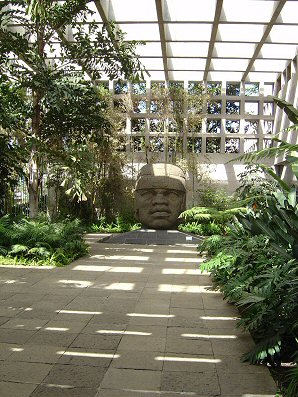 2n - Olmec head artefact, possibly a king's head, hundreds of Olmec heads have been discovered so far, kings carved in succession, Olmec's are black Africans shipped to the Yucatan by Ningishzidda due to his expulsion from Egypt by his brother Marduk, the 1st earthlings to inhabit So. America, as dislpayed by Sitchin in the Mexico City Museum