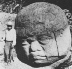 2r - Olmec head artefact, possibly a king's head, hundreds of Olmec heads have been discovered so far, kings carved in succession, Olmec's are black Africans shipped to the Yucatan by Ningishzidda due to his expulsion from Egypt by his brother Marduk, the 1st earthlings to inhabit So. America, as dislpayed by Sitchin in the Mexico City Museum