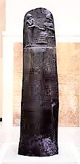 1 - Utu gives law code to giant semi-divine Babylonian King Hammurabi, Hammurabi's Law Code engraved into fashioned & polished stone artifact; he handed down the god's laws