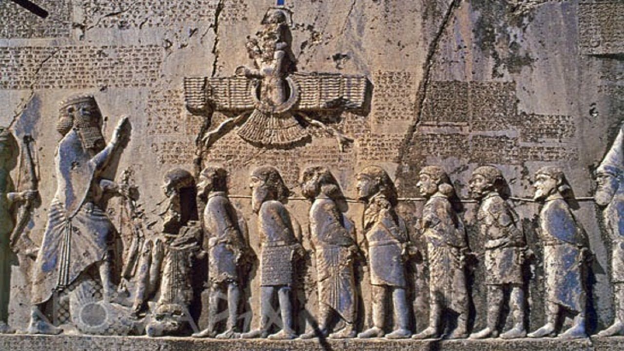 7b - Utu in his winged sky-disc / flying saucer above giant Persian King Darius & some little earthlings in captive; the gods would call for war to their kings & then go insure victory for their kings, giving protection from the air all the way through the battles