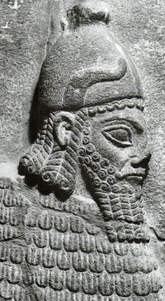 13 - Hittite artifact of Adad with a single row of animal horns on his royal crown headdress