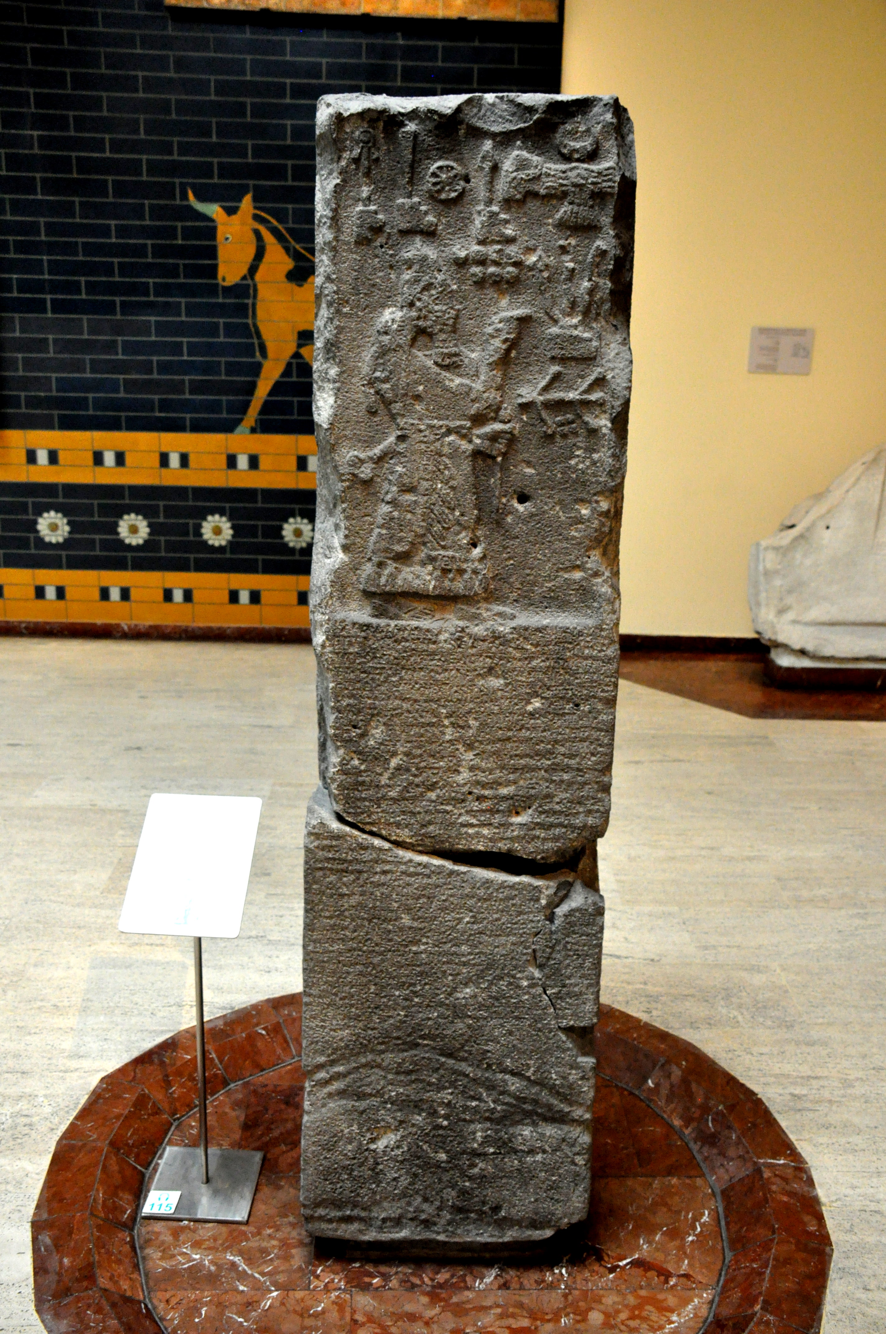 17c - Adad-nirari III obelisk, Assyrian king 810-783 B.C., Adad-nirari points to the many symbols of the gods, emphasizing their importance to his & all of us
