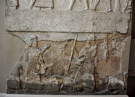 18a - Tiglath-pileser III victorious over an enemy, relief from the Central Palace at Nimrud., victory came by the protection of the patron god or gods