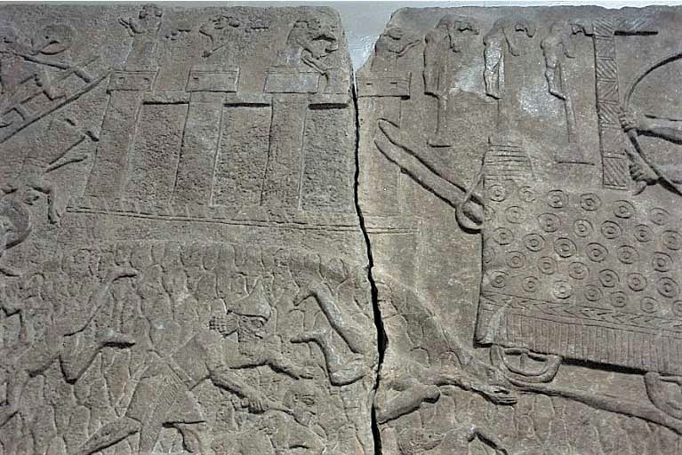 18d - Tiglath-Pileser seige scene, war of man demanded of kings by their patron gods, meanwhile many men die for the cause