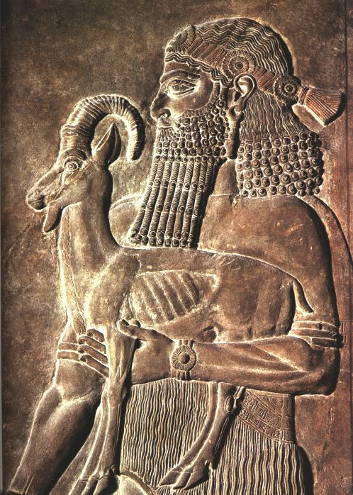 19j - Sargon II with dinner, ancient relief, an animal sacrifice to the gods was a bar-b-que dinner for the gods who could eat the entire sacrifice