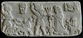 51 - Adad in his sky-chariot; Adad, Shala, & son Sarruma