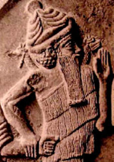 53 - Ningishzidda with his entwined horned serpents symbol appearing upon his shoulders