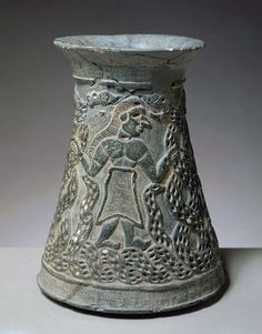82 - Ningishzidda with his horned serpents on votive vase artifact