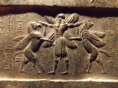 17 - winged warrior Ninurta or Marduk battles animal symbols of opposing alien gods