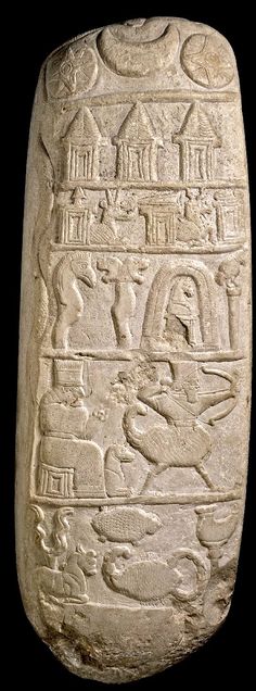 2aa - Bau seated with dog & spouse Ningirsu with alien weaponry on Nebuchadnezzar I kudurru