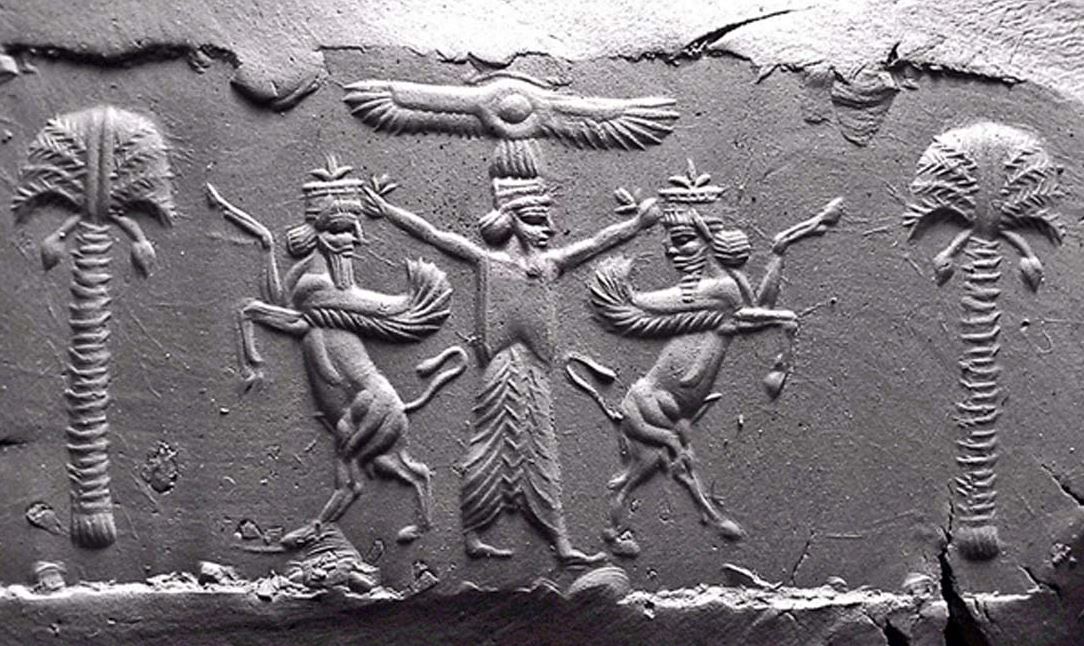 36 - Marduk under winged sky-disc holds 2 winged unidentified animal symbols for gods