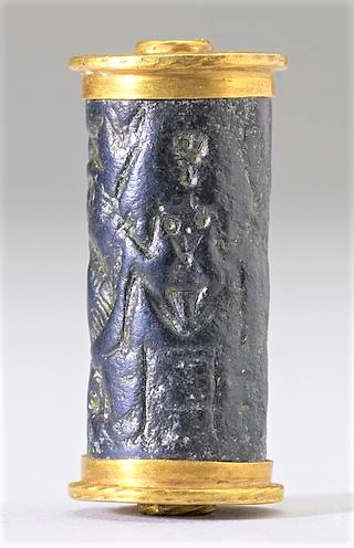 48 - cylindar seal of a nude goddess giving birth
