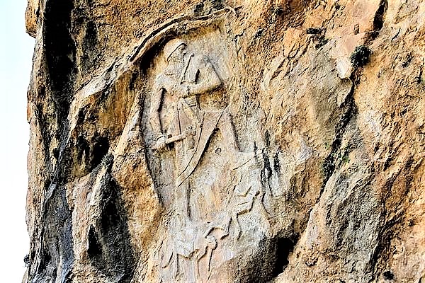 6f - semi-divine giant King Naram-Sin standing upon fallen enemy,  Rock Relief at Darband-i-Gawr, Qaradagh Mountain, Sulaymaniyah. Iraq