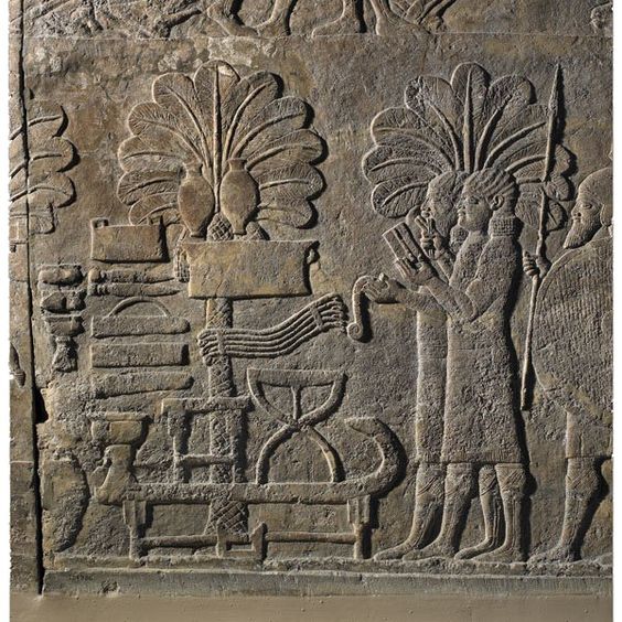 Assyrian artifact of scribes counting heads