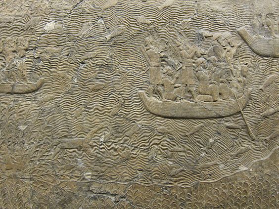 18 - boat packed with Mesopotamian men