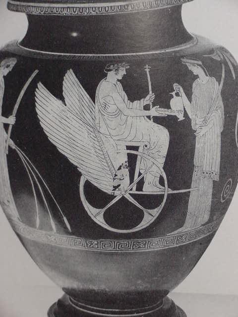 51 - giant Greek sky-god & his winged wheel; sky-disc