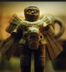 73 - Olmec artifact of winged astronaut in his sky-suit