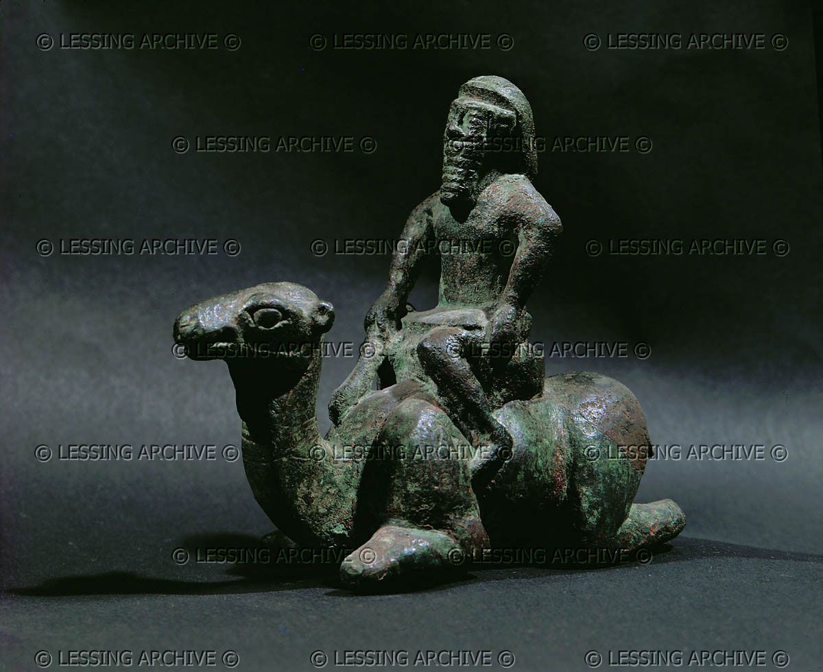 5 - camel with alien giant god mounting or dismounting