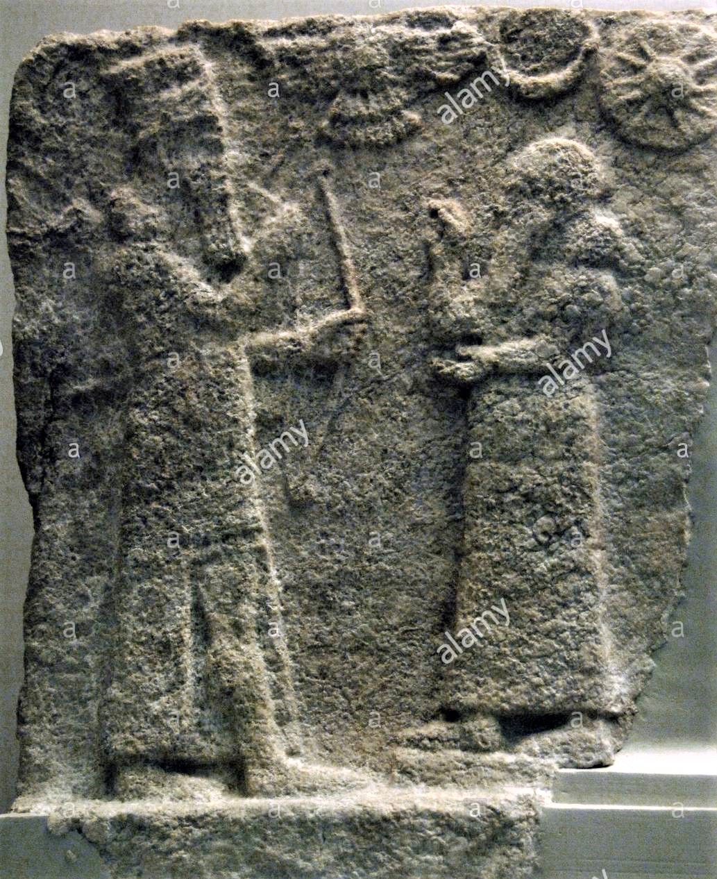 16e - Ashur with his semi-divine mixed-breed Assyrian king