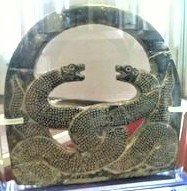 22 - artifact of entwined serpent symbol of Ningishzidda's work fashioning modern man