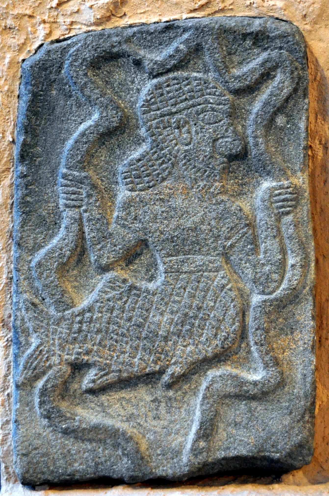 22a - holds snake symbol of Ningishzidda