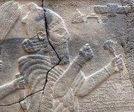 2h - winged sky-disc on ancient stone bas relief, late Hittite period