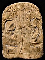 4h - Egyptian stele with winged sky-disc hovering above scene