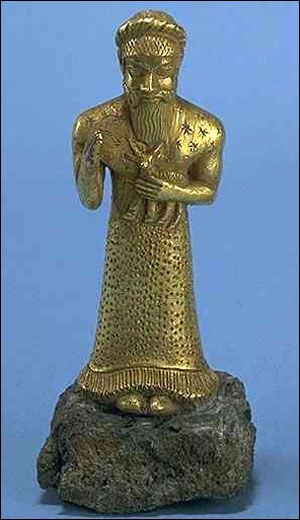 38 - golden statue of Enki, wisest of the gods, credited with doing many major things fashioned on Earth Colony