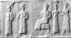 69 - Ninsun, unidentified semi-divine king, Nannar seated on his throne in Ur, & two unidentified gods; Nannar is the Moon god symbolized by the Moon crescent