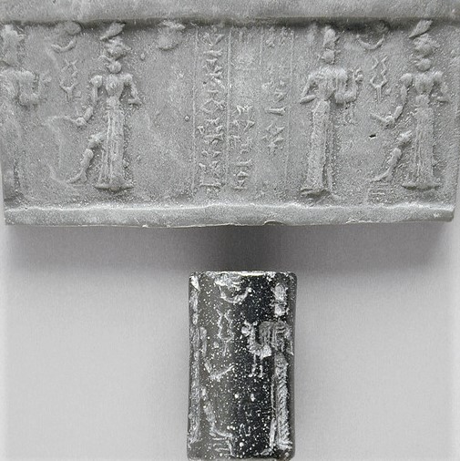 46 - ancient seal with Nannar with dinner & son Utu with his rock cutter in hand