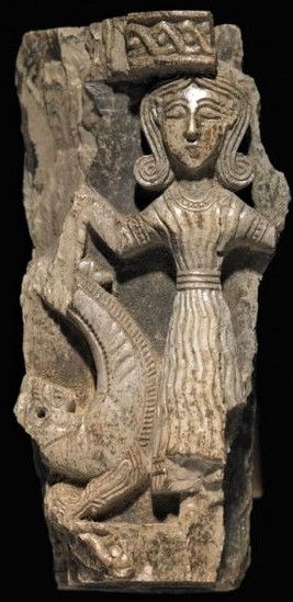 1w - giant goddess Inanna relief holding a lion by way of the strength of the gods