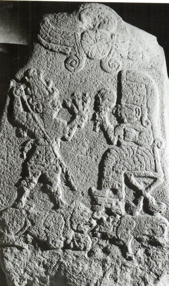 23 - ancient stele of Adad with high-tech weapon in hand, & seated Shala, spouse & aunt; winged sky-disc / fllying saucer above