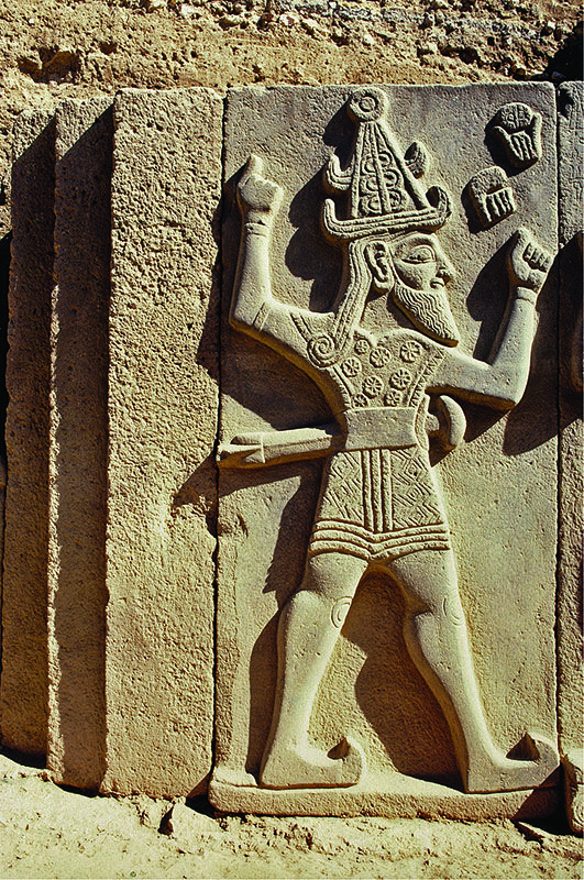 66 - stele of Adad with empty hands but in the pose of holding his high-tech weaponry