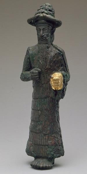 1bc - statue of Enki with golden hand; Enki came for the gold and ended up doing much more than mine for it; he is responsible for us now looking like them