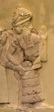 3 - Ningishzida, with snakes emanating from his shoulders on a relief of Gudea